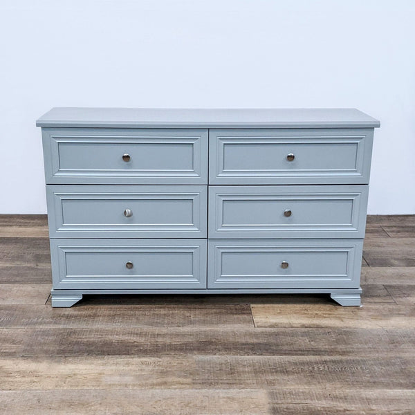 Southlake dresser with six drawers, winter gray, metal knob pulls.