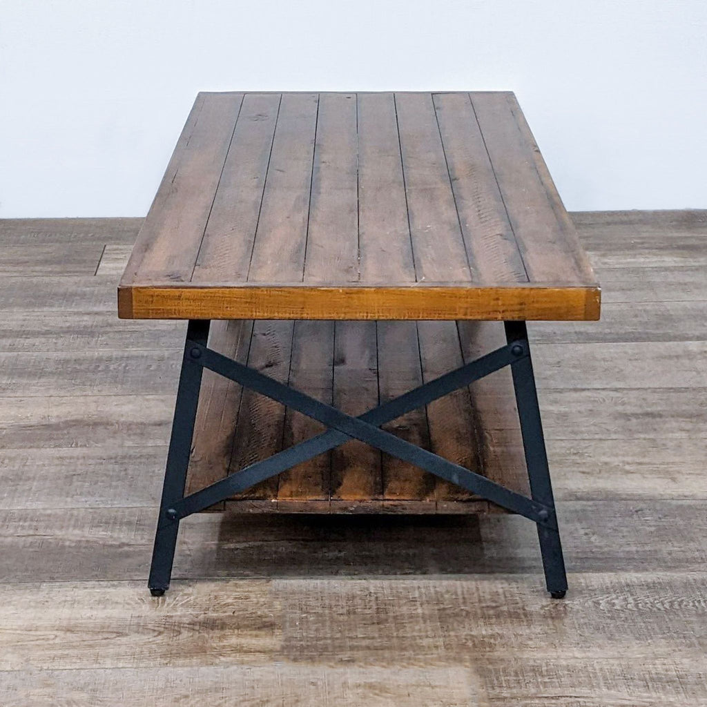 Solid wood coffee table with steel legs and open storage.