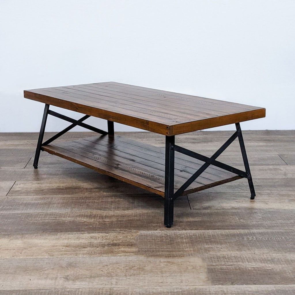 Industrial coffee table in pine brown finish with lower shelf.