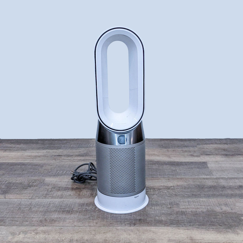 Dyson Purifier Cool Gen1 TP10 on wooden floor, showcasing sleek design.
