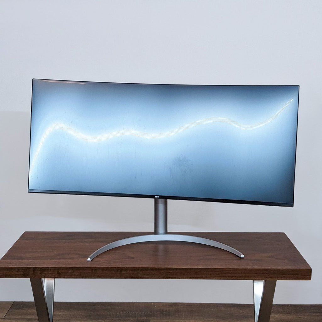 LG UltraWide Monitor 40WP95C, a 40" curved display on a wooden desk.