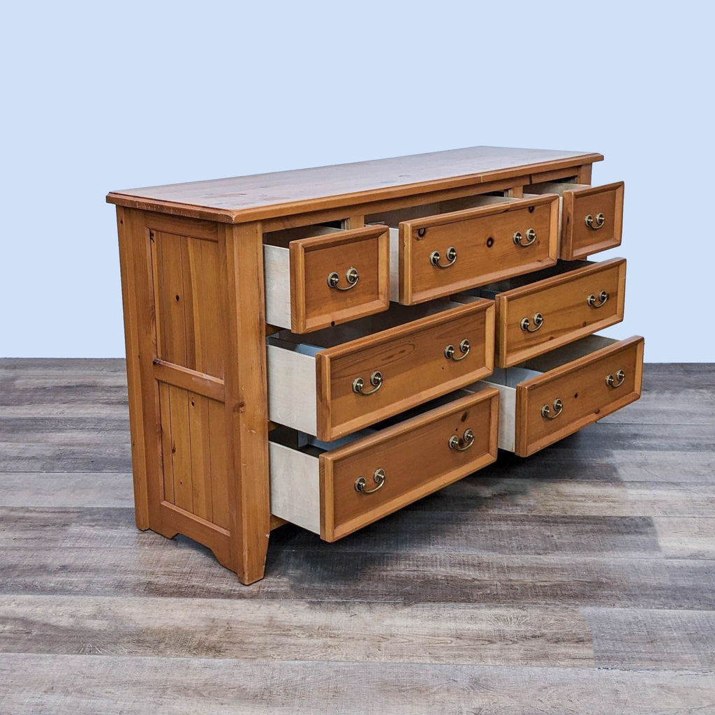 Side view of the Reperch dresser, showing drawers partly open.