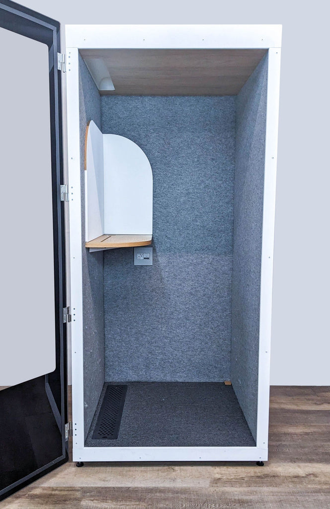 the inside of the door is a small room with a door that opens to a small room with