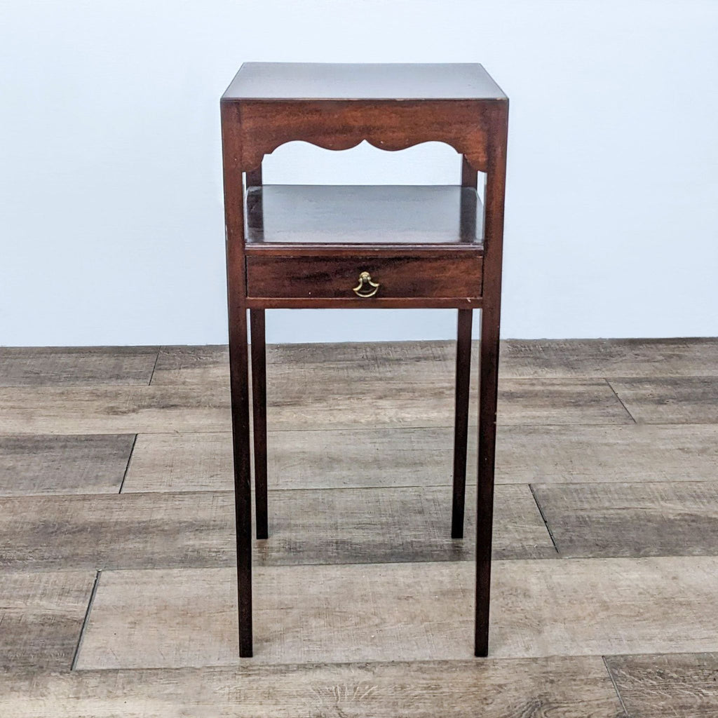 Side table with scalloped apron and metal hardware by Reperch.