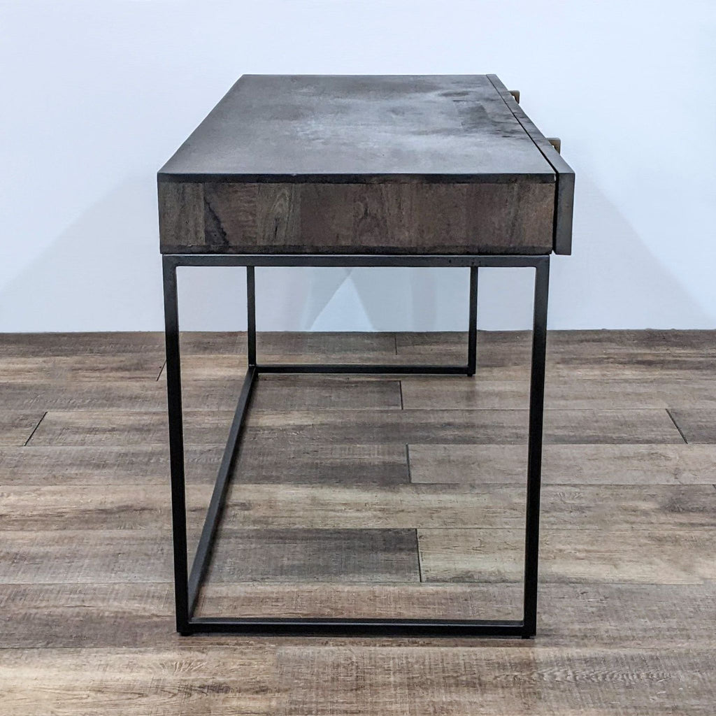 a modern industrial style table with a metal base and a metal base.
