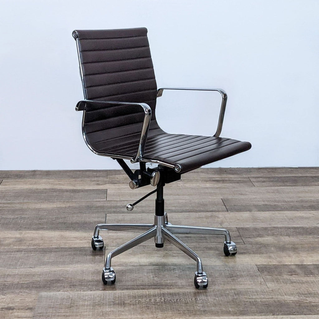 Angled view of sleek brown office chair with adjustable height and swiveling base.