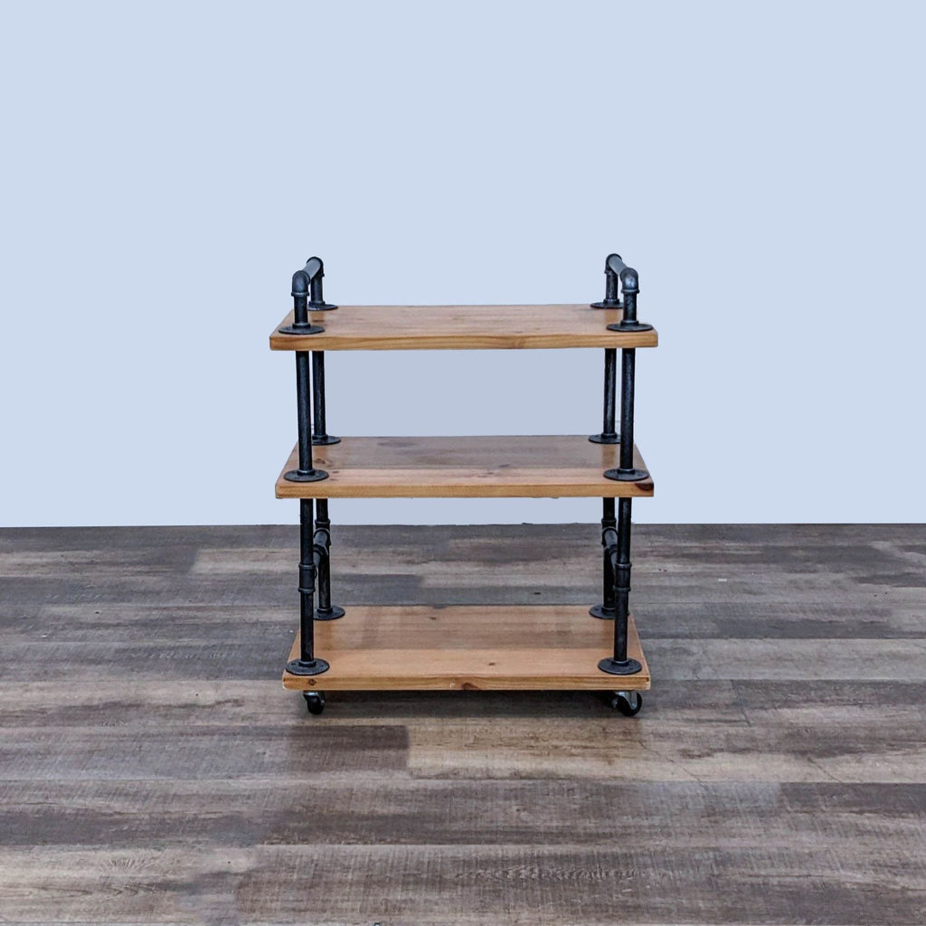 Three-tier wooden shelf with water pipe frame, durable and mobile.