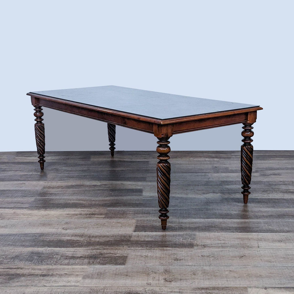 Reperch Early American Harvest Style extendable dining table with twisted legs on a wooden floor.