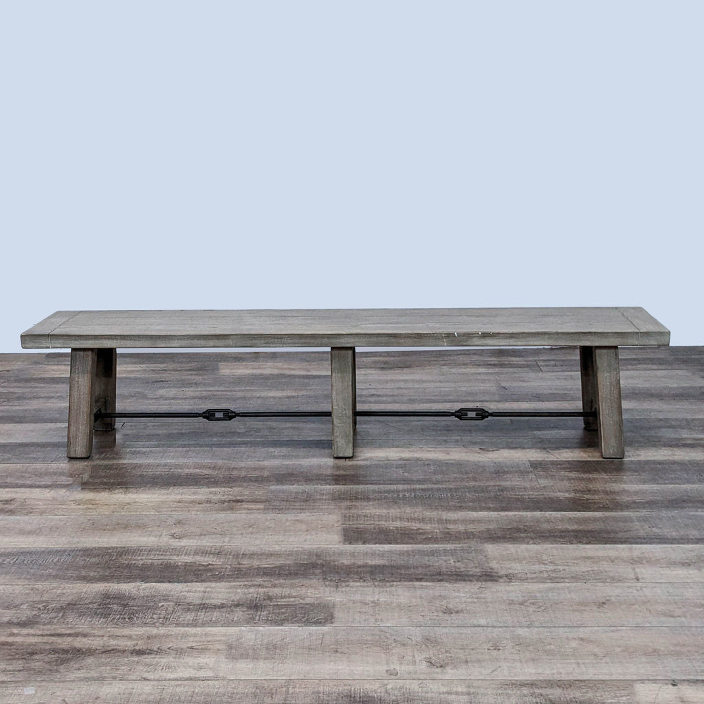 Alt text 2: Extra long solid wood bench with metal details by Pottery Barn, showcased on wooden flooring.