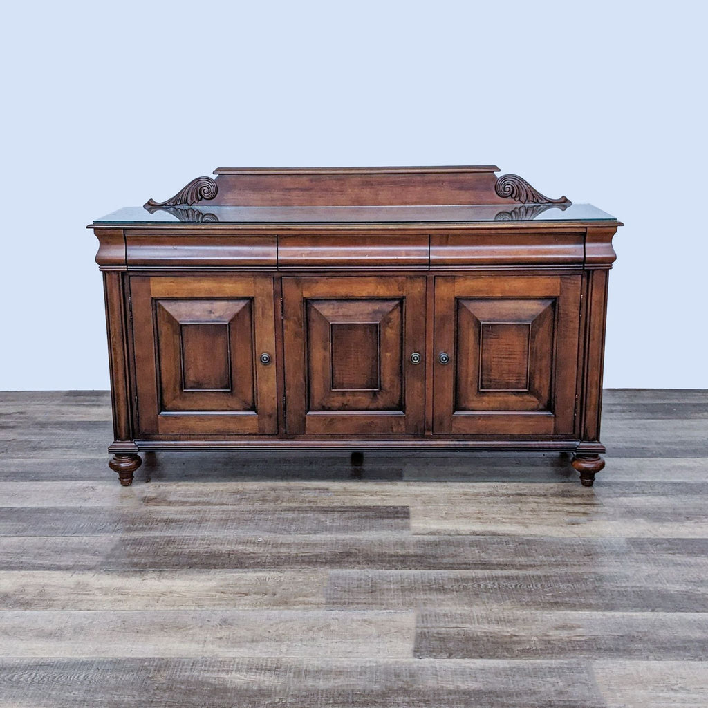 Ethan Allen buffet with beveled doors and carved back panel.