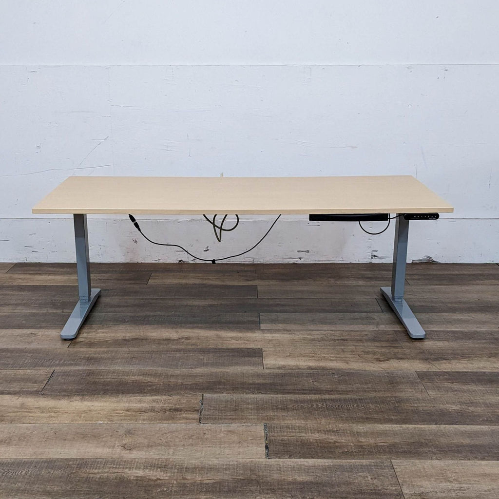 Uplift's modern office desk features motorized height adjustments and ample surface area.