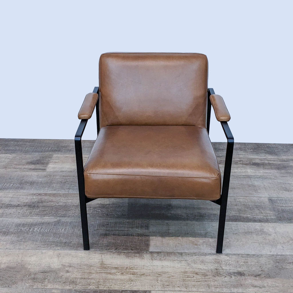 Top view of the West Elm Highline chair showing padded arms and steel frame.