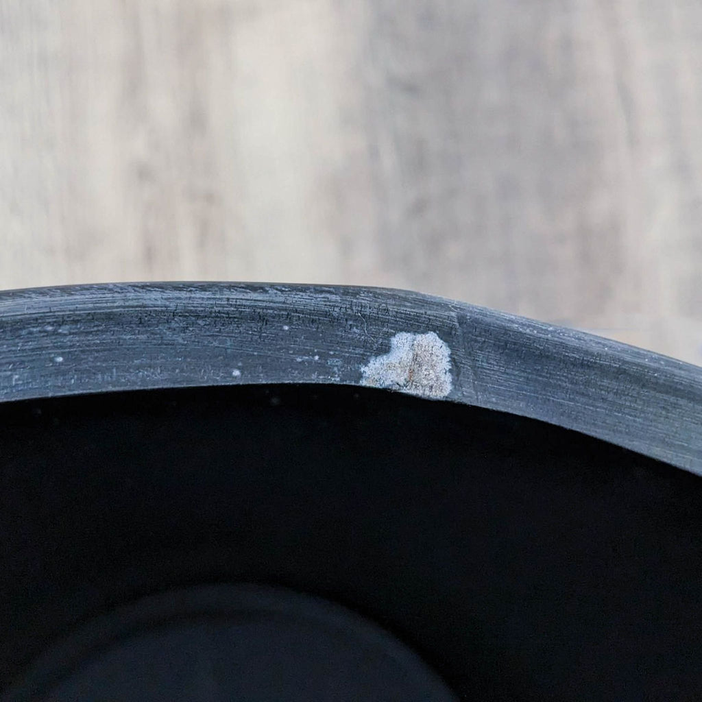 Close-up of wear on the rim of Reperch drum table.
