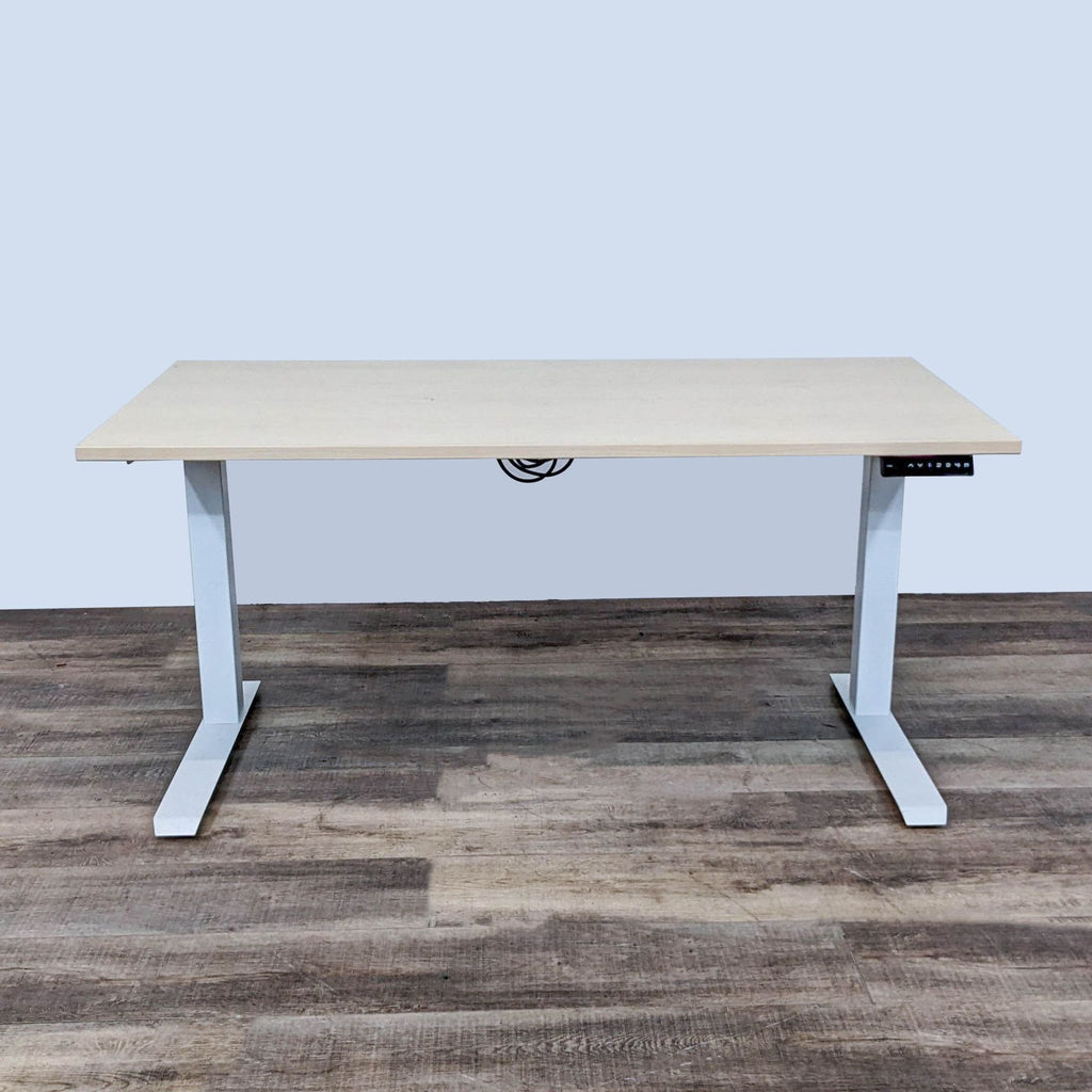Electric height-adjustable desk with oak finish, featuring a dual-motor lift system for ergonomic use.