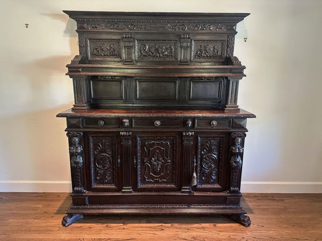 3. Classic dark wood cabinet with detailed carvings, stylish panels, and functional storage drawers and compartments.