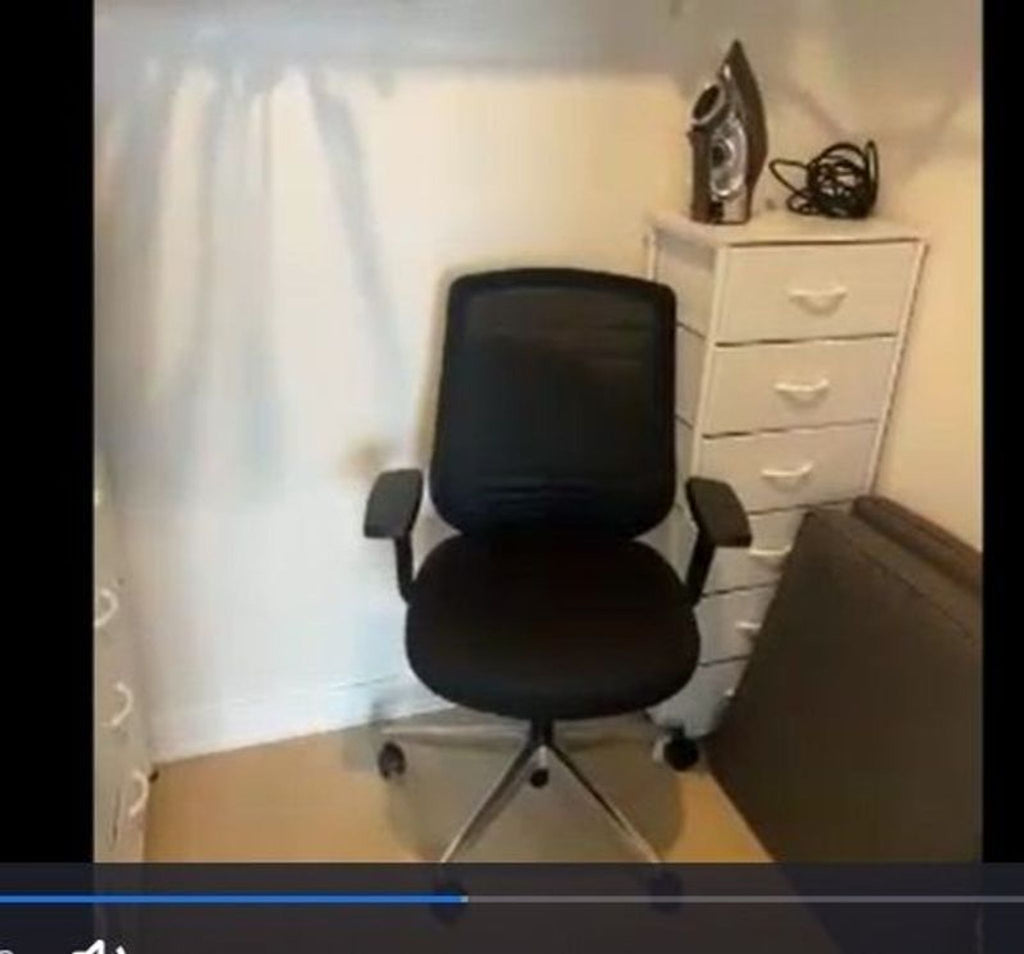 1. Reperch office chair with mesh back, armrests, and wheels, placed in a small room next to white drawers.