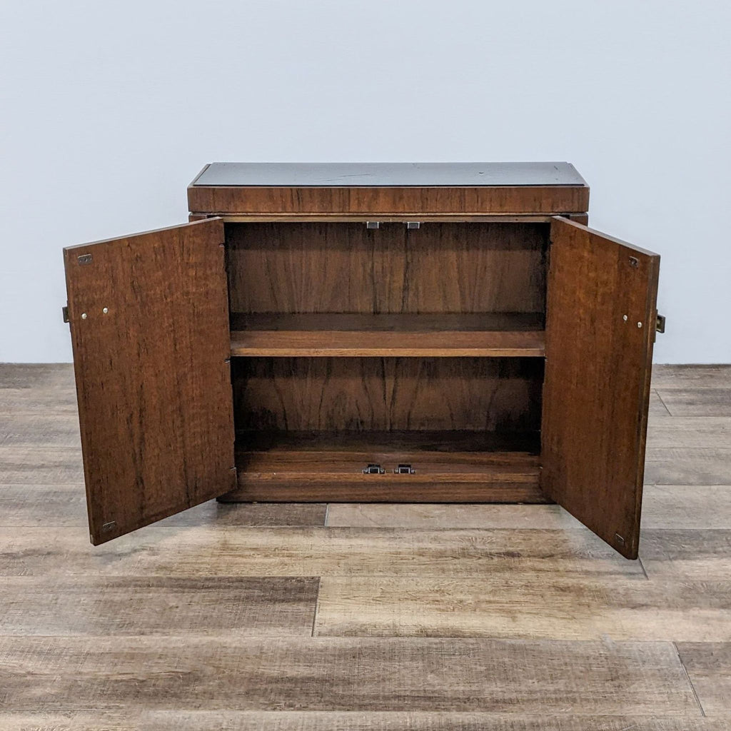 vintage mid century modern walnut bookcase. this piece is in good condition. the top is made