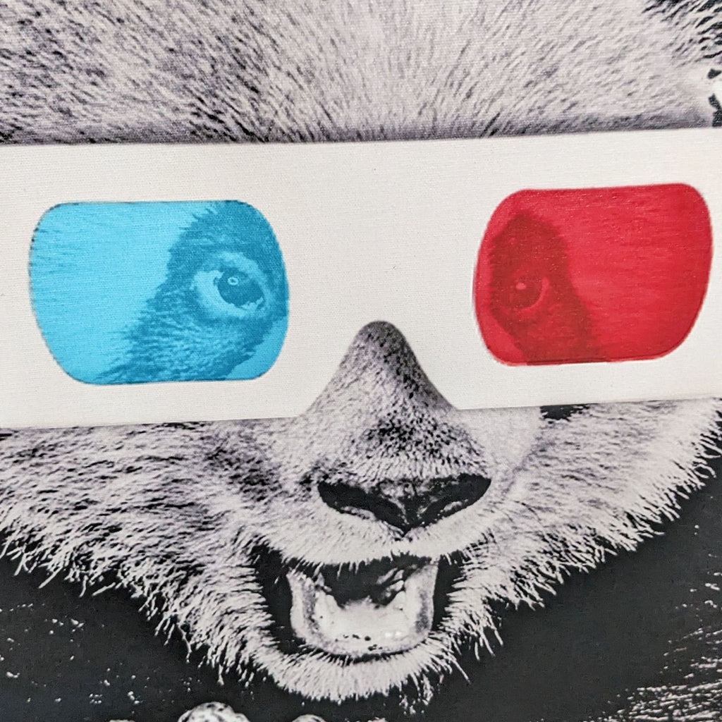 Close-up of a panda print with 3D glasses in red and blue.