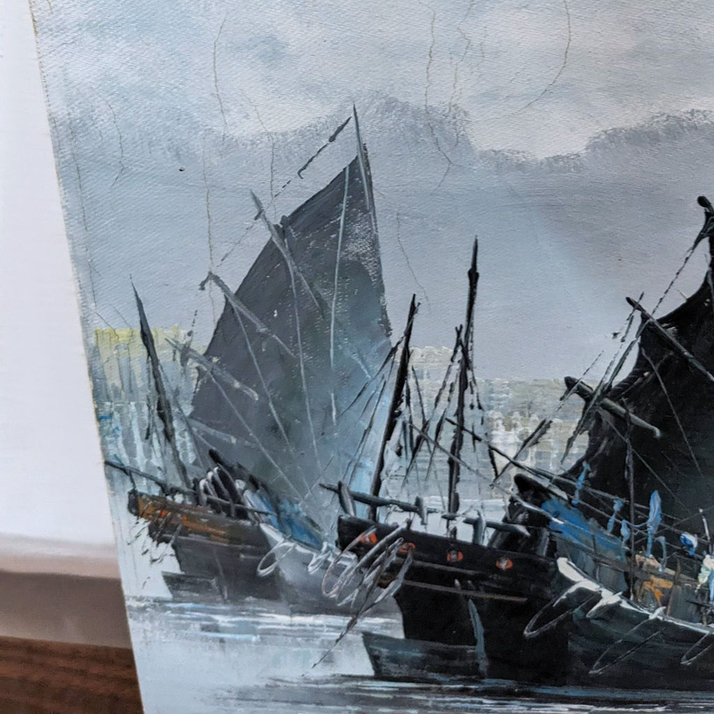 Close-up of sailboat details from a painting, showcasing intricate brushwork.