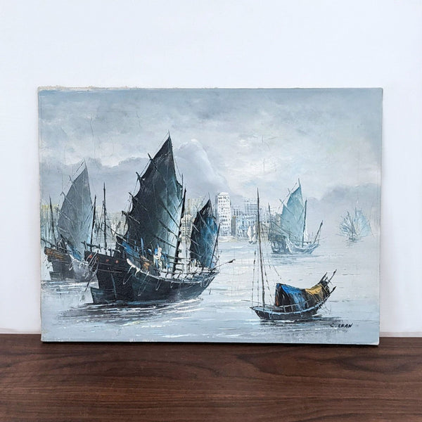 Sailboats in a harbor with a city skyline in the background, painted by an artist.