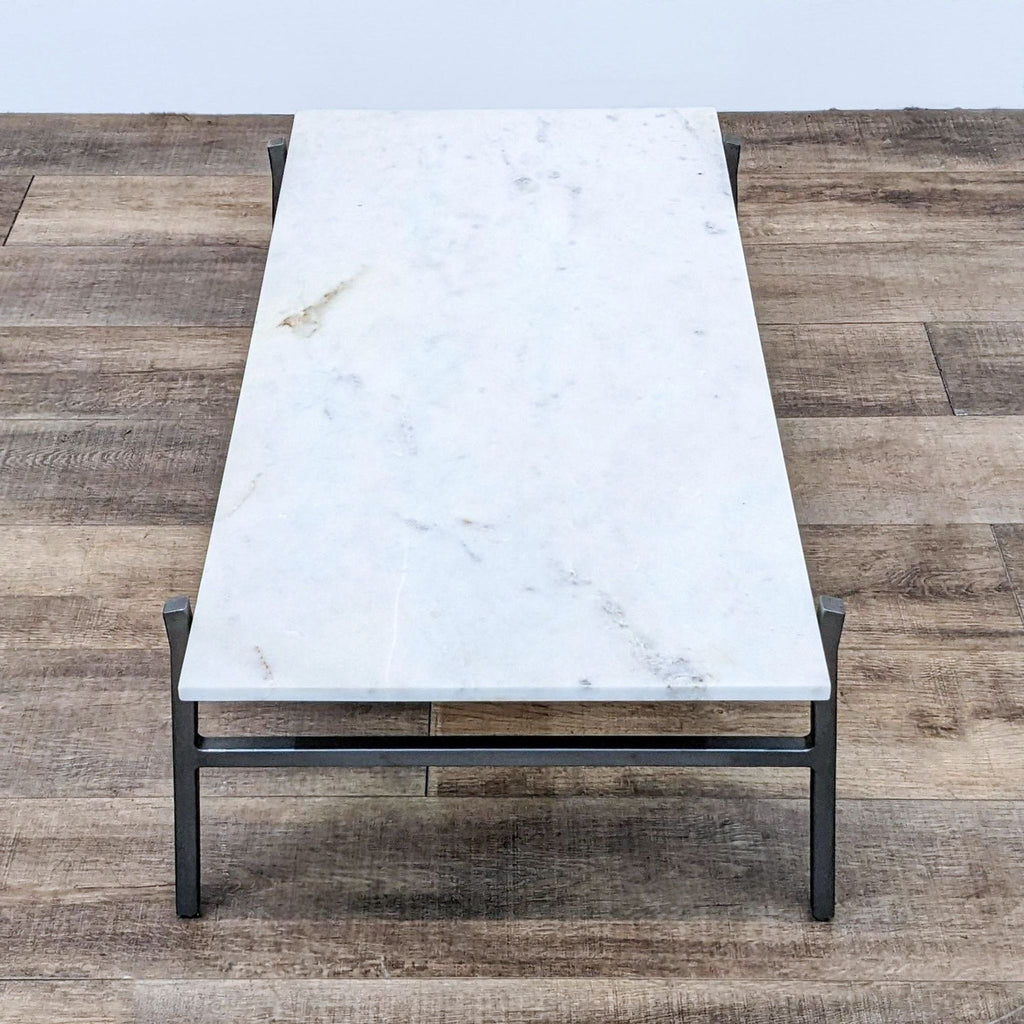 Top view of marble coffee table with sturdy steel base.