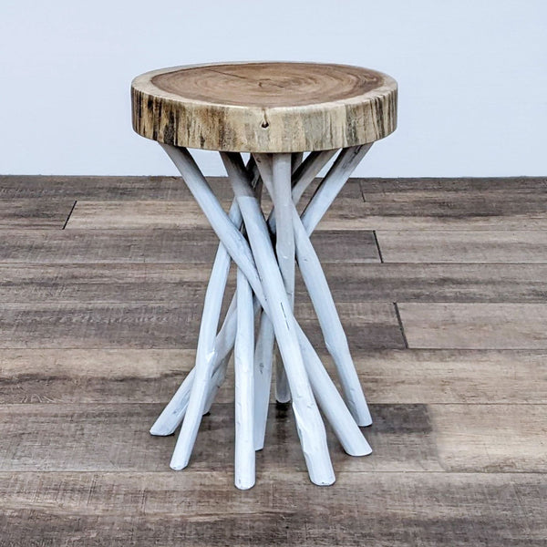 Reperch side table with natural wood top and multi-branch base on wooden floor.