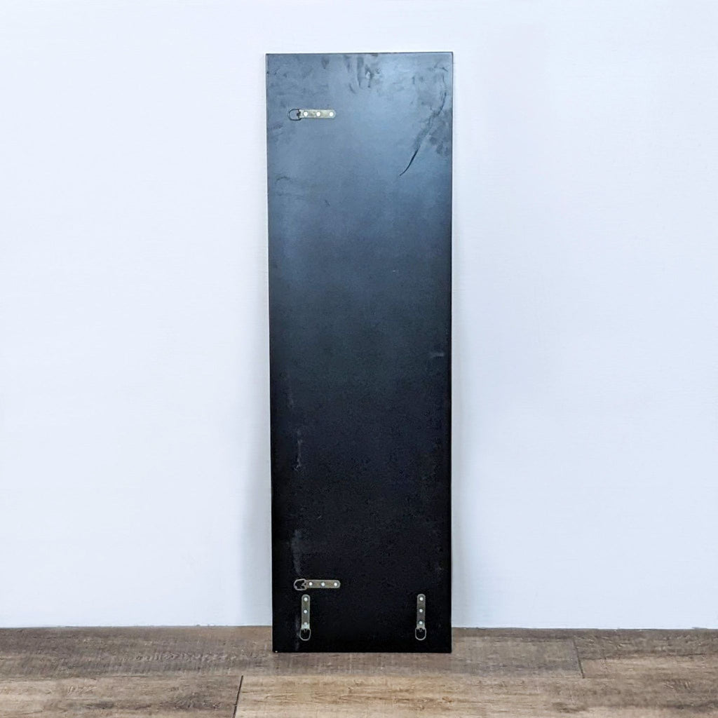 Rear view of a Reperch large rectangular mirror showing its fixed hardware for wall mounting.