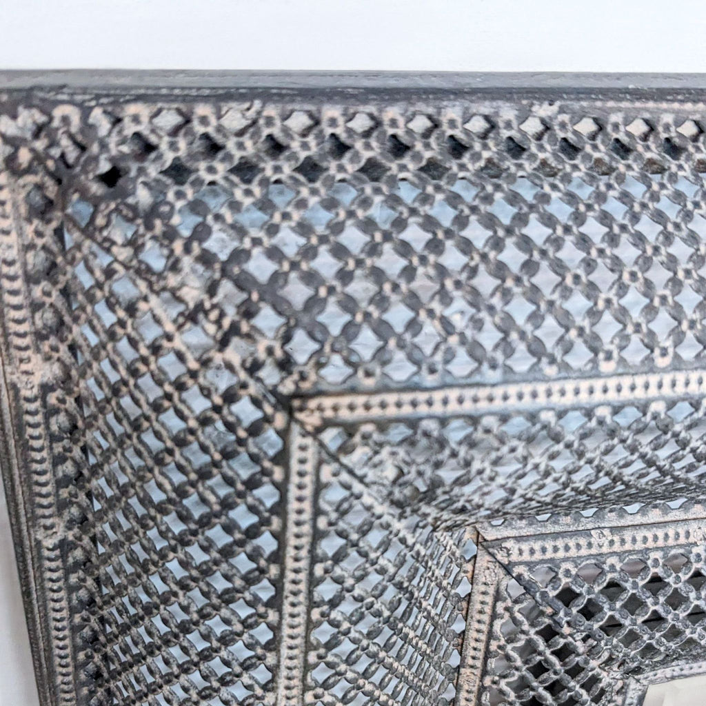 Close-up of Uttermost mirror's uniquely textured frame detail.