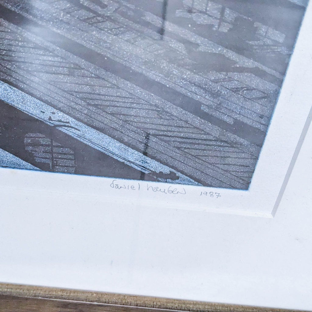 Close-up of Daniel Hauben's signature on the framed print titled "Evening Rain."