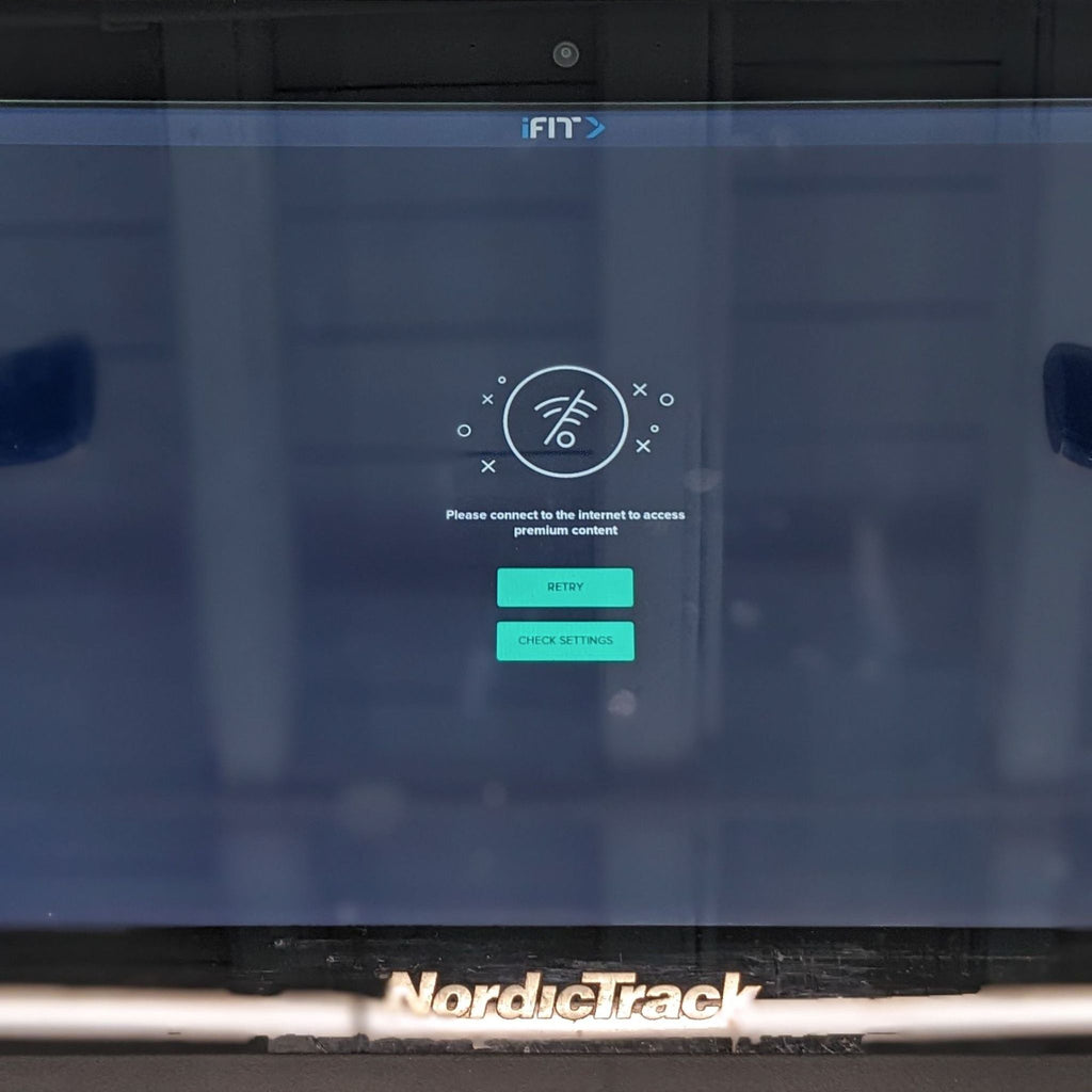 Close-up of NordicTrack treadmill console with internet connectivity options on display.