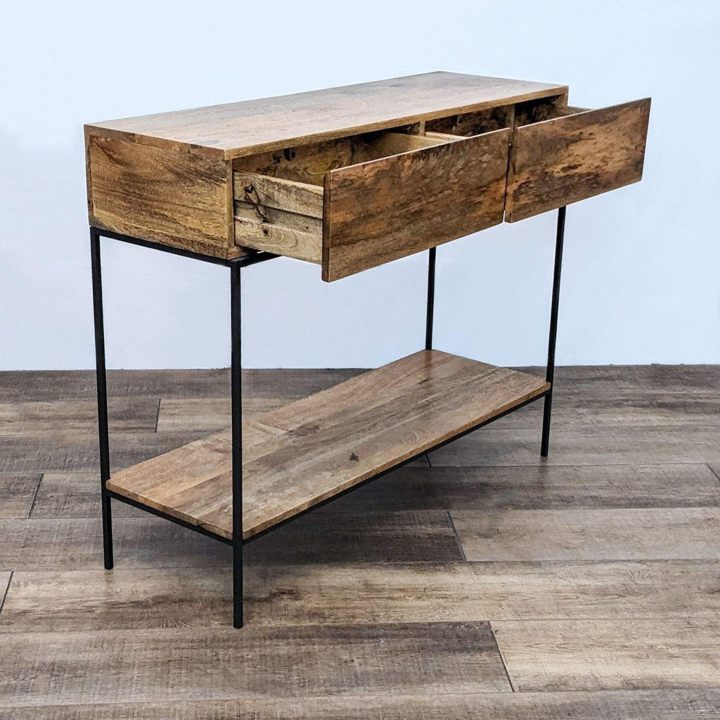 Side view of mango wood console, showcasing open drawers and shelf. 