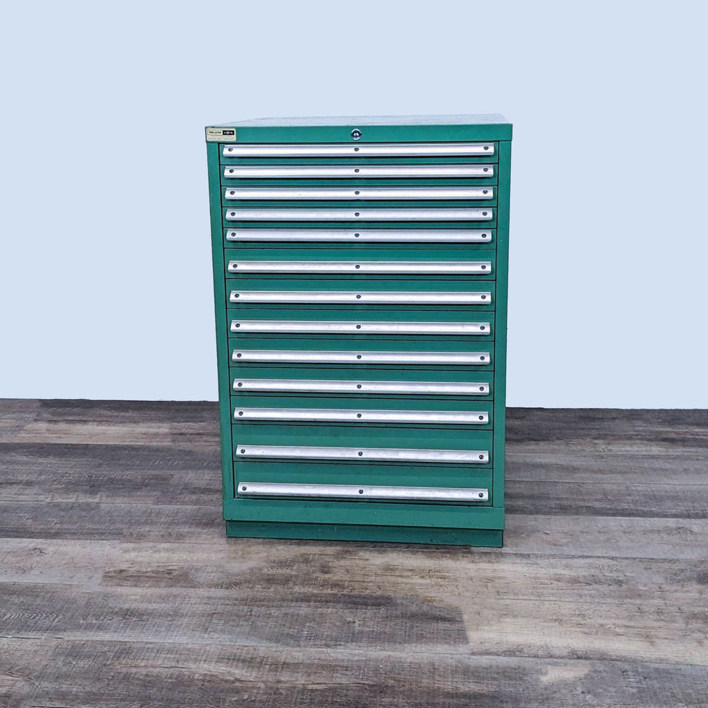 Durable green tool cabinet with 13 slim drawers for organized storage.