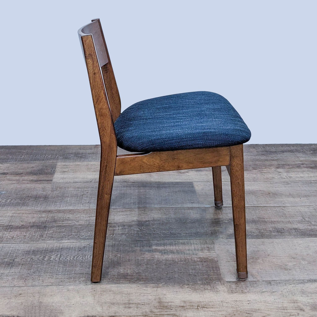 Side view of the Baltimore dining chair showing mid-century design features.