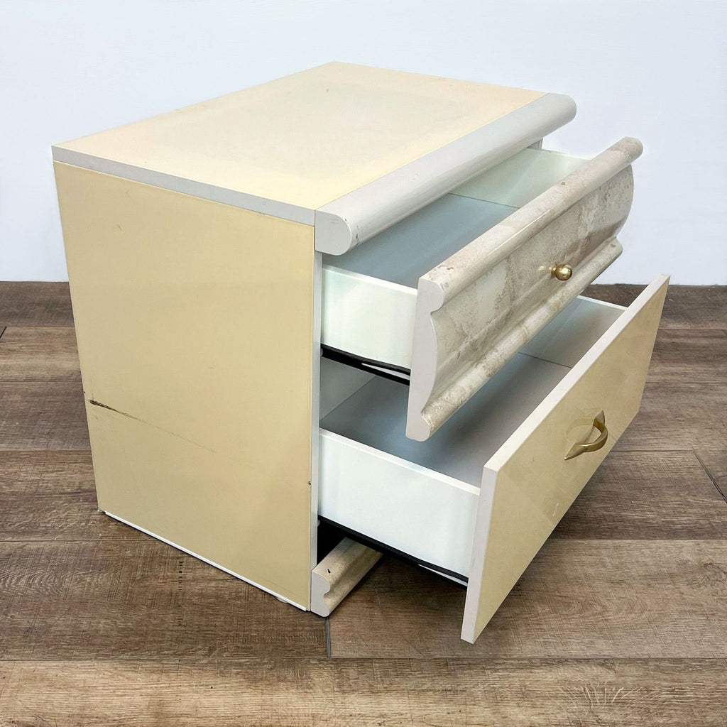 Image 2 alt text: Opened beige Reperch end table displaying two white inner drawers with a distressed finish on a wooden floor.