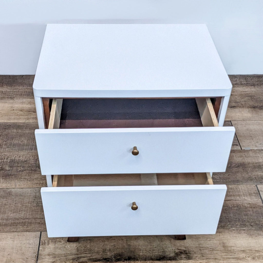 Top view of Oliver Space table with drawers partially open.