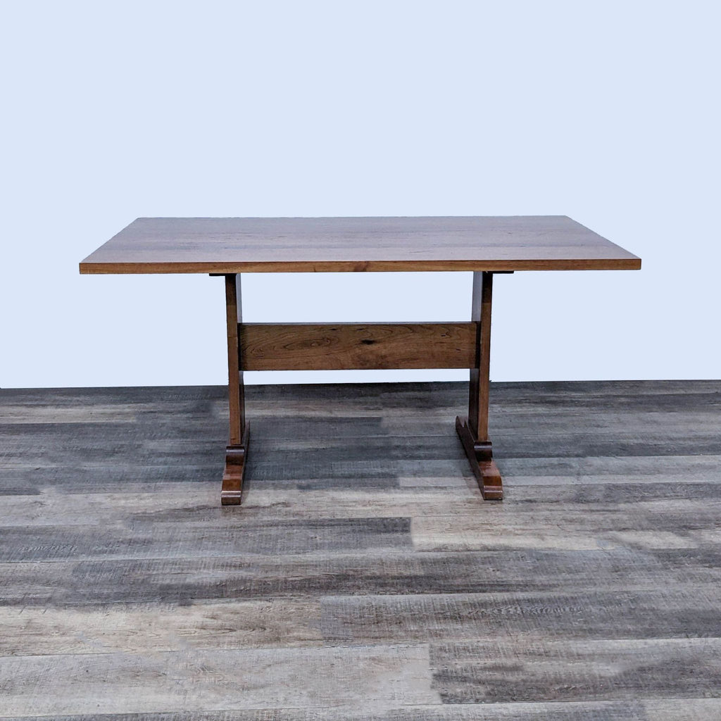W.A. Mitchell square wooden dining table with sturdy legs, part of a classic yet modern dining set.