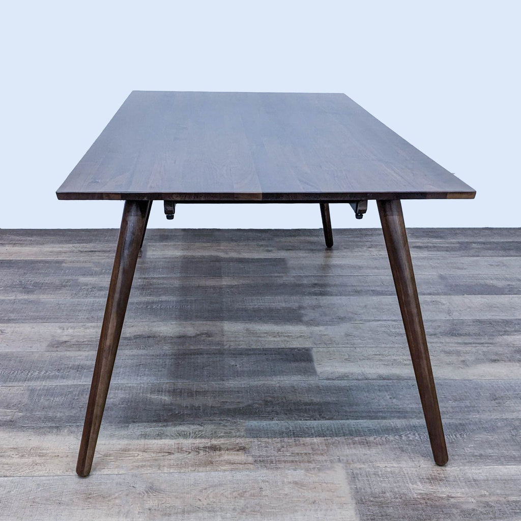 Article's Seno dining table showcasing sleek design and minimalist style.