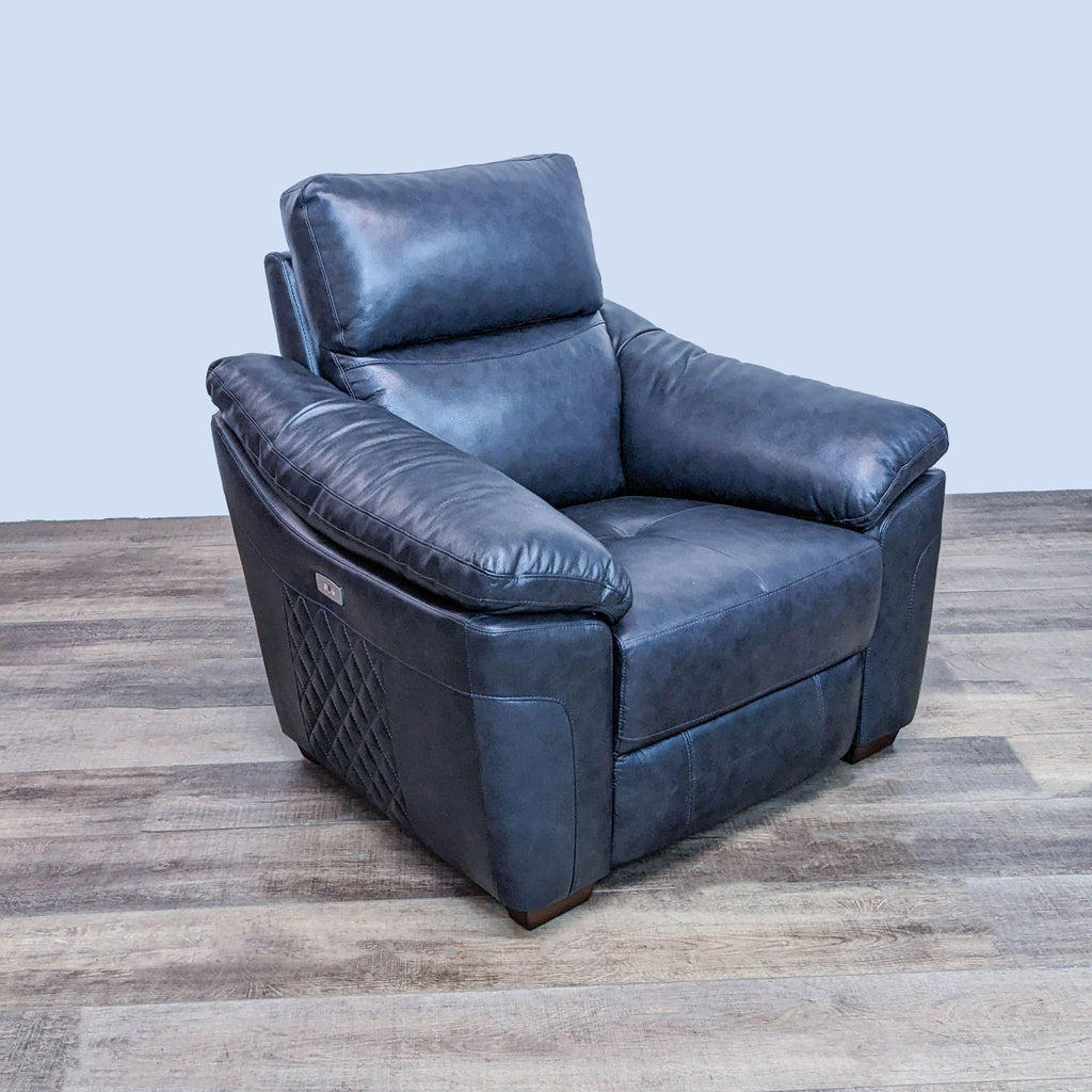 The Larue power recliner from Fremont & Park with wood legs, USB port, and quilted accents in a transitional style.