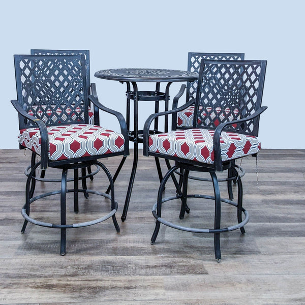 Aluminum table set with four swivel chairs and cushioned seats.  