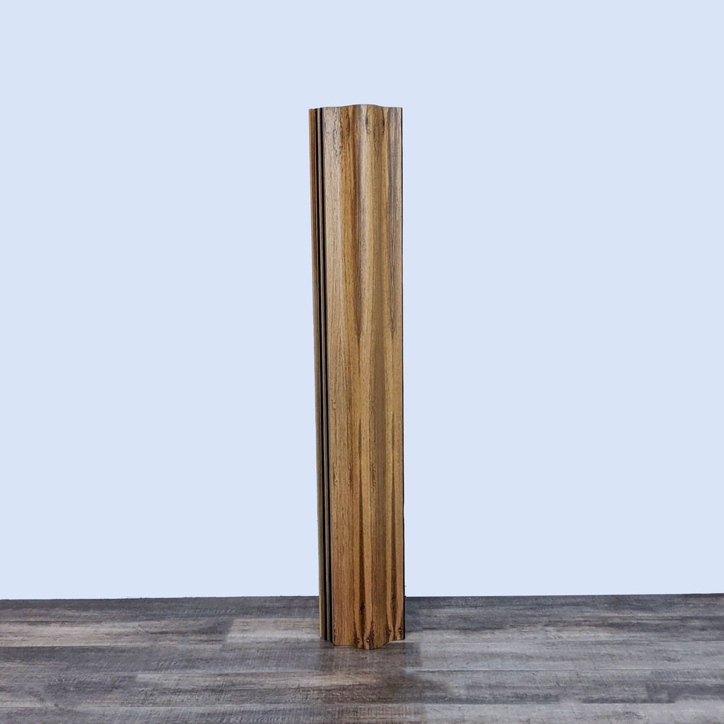 Folded Herman Miller rosewood screen from the Eames' 50th Anniversary collection, released in 1996.
