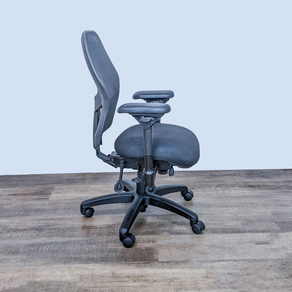 Side profile of Bodybilt ergonomic chair showing lumbar support and adjustable height.  