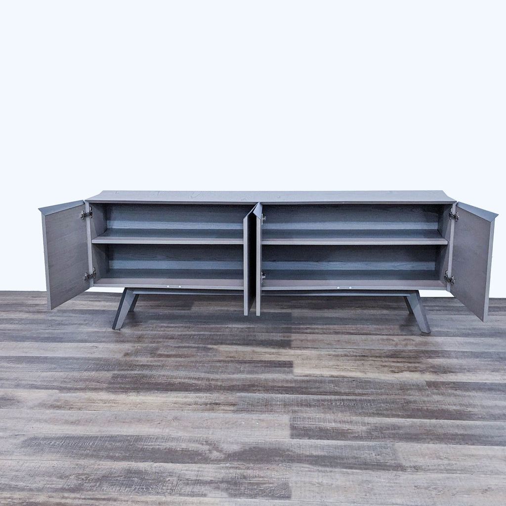 Alt text 2: Open Roche Bobois sideboard showcasing interior shelves and unique structural design with contrasting wood grain directions.