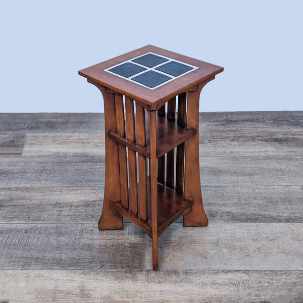 Mission style side table with tile top and two shelves, in wood tone finish. Ethan Allen brand.