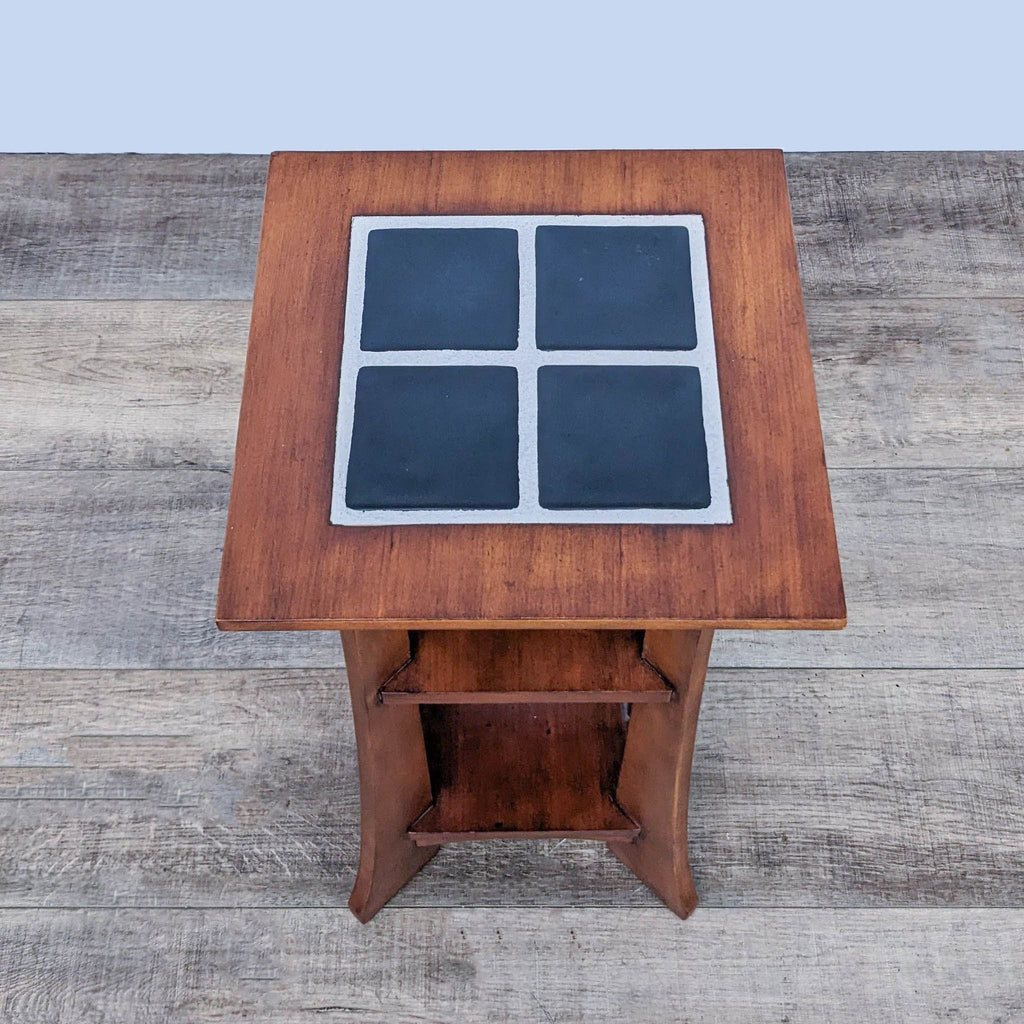 Tile-topped Ethan Allen console table with two-tier shelves and distinctive mission-style wooden design.