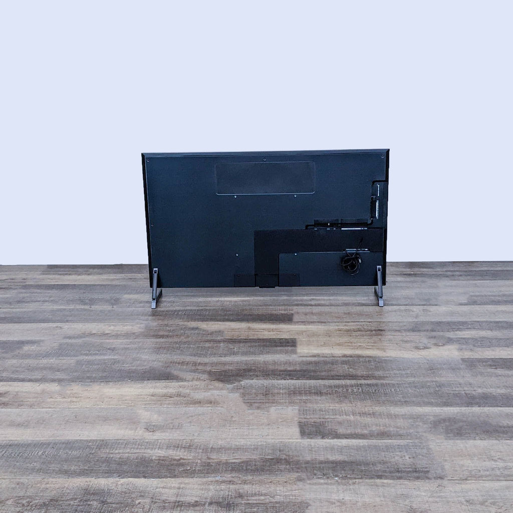 Back view of LG TV shows multiple ports for seamless device connectivity.