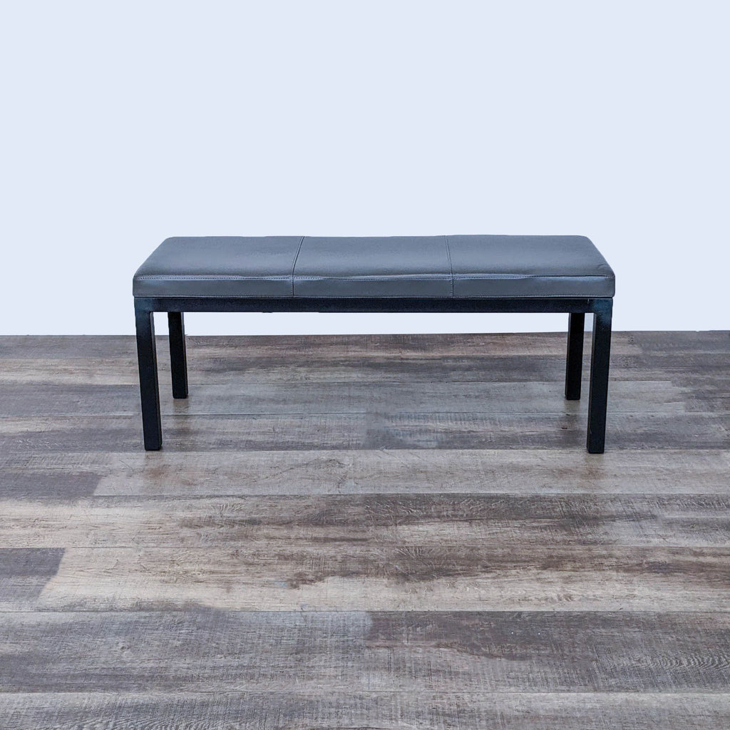 Solid wood frame bench with padded seat, ideal for extra seating in any room.