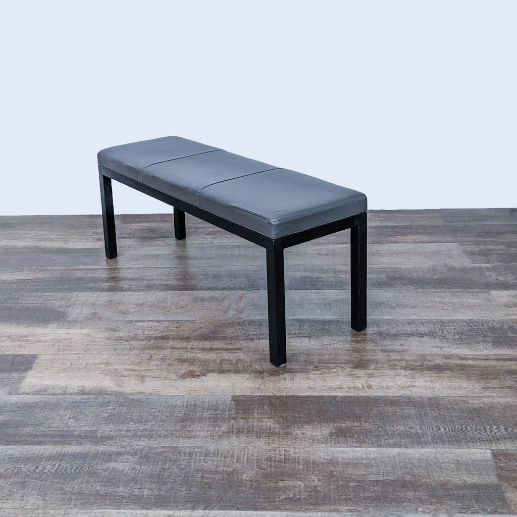 Reperch bench with neutral tone cushioned seat, perfect for versatile room decor.