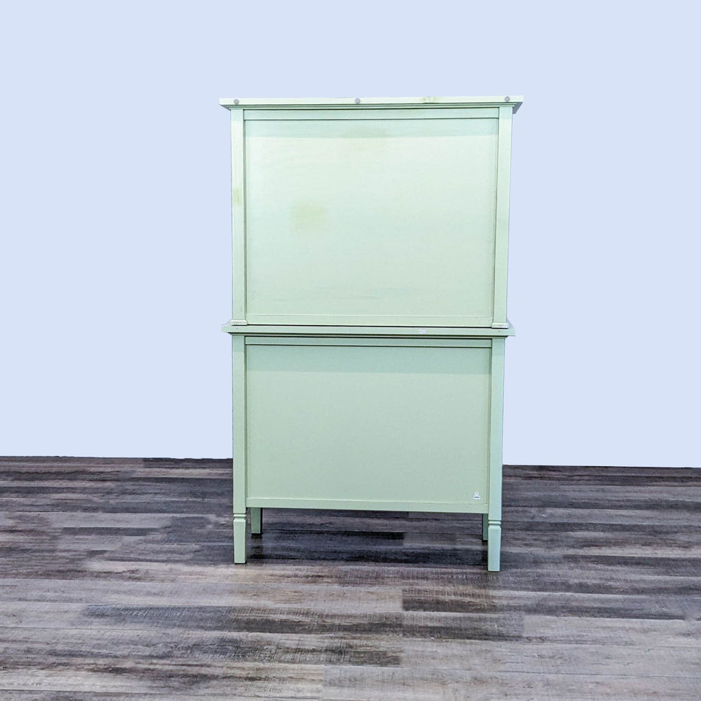 Back view of two-piece hutch from Crate & Barrel, with a painted finish, no visible details.