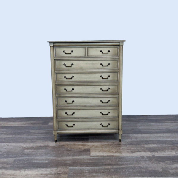 1. Vintage wooden dresser by Reperch with six drawers and antique handles, shown from the front.