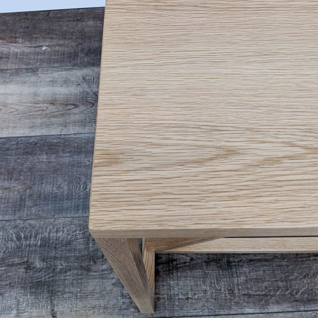 Close-up of the natural wood texture on a Reperch console table.